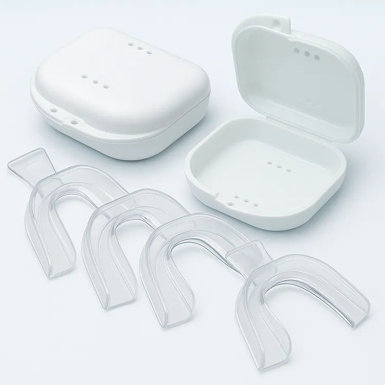 Four mouldable teeth whitening trays with two hygienic cases