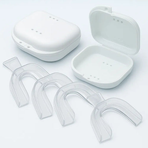 Four mouldable teeth whitening trays with two hygienic cases